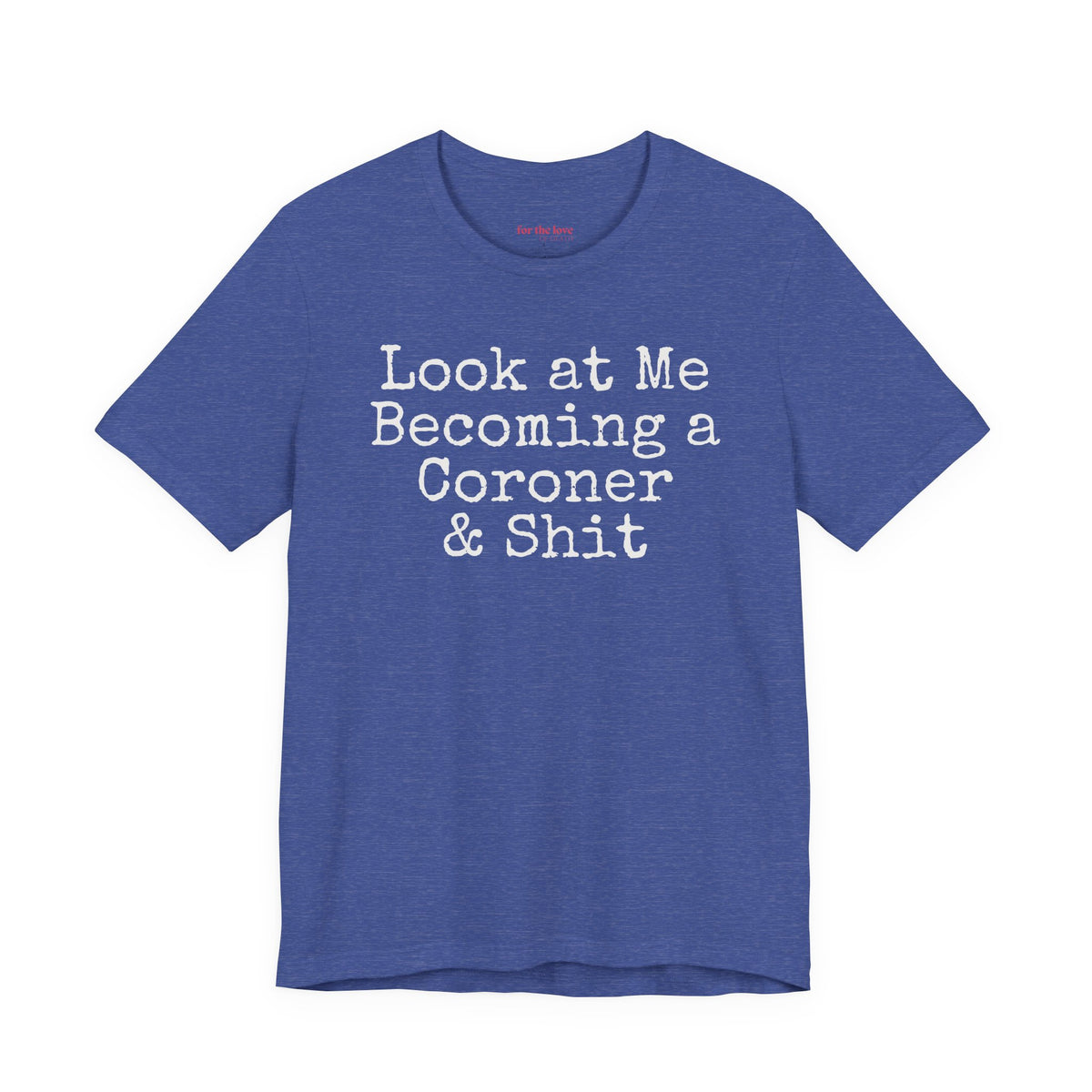 Royal Blue funny coroner T-shirt featuring the phrase Look at Me Becoming a Coroner & Shit in vintage typewriter-style lettering.